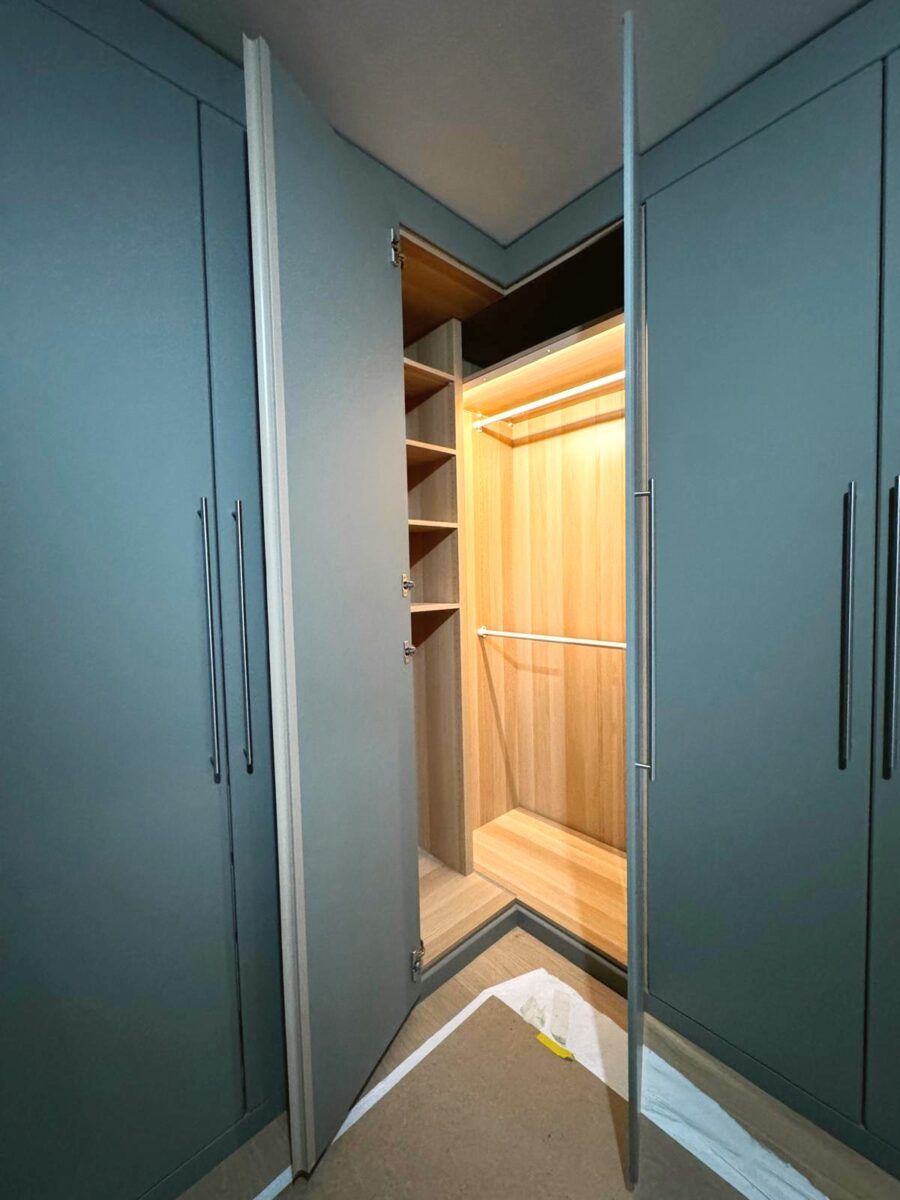 Petrol-blue wardrobe, wood interior