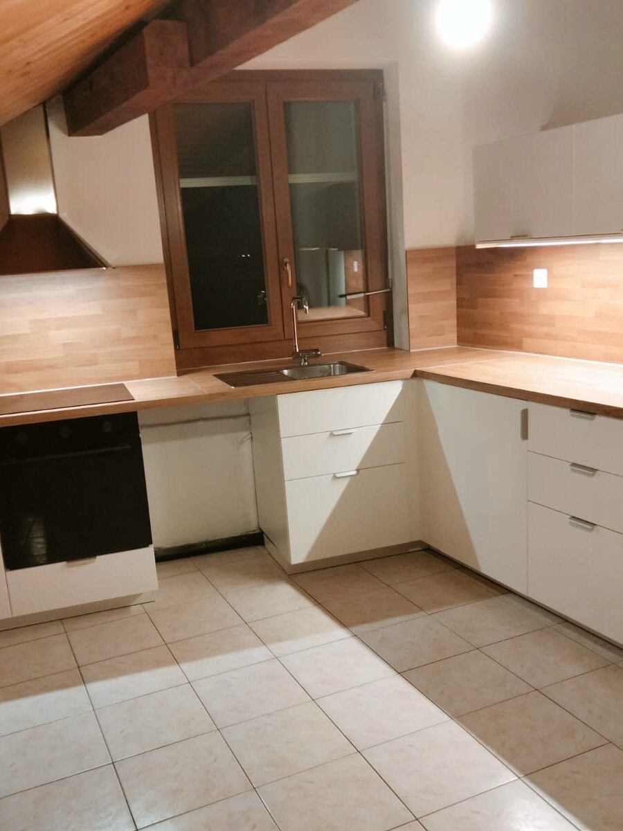 Attic kitchen, wood splashback